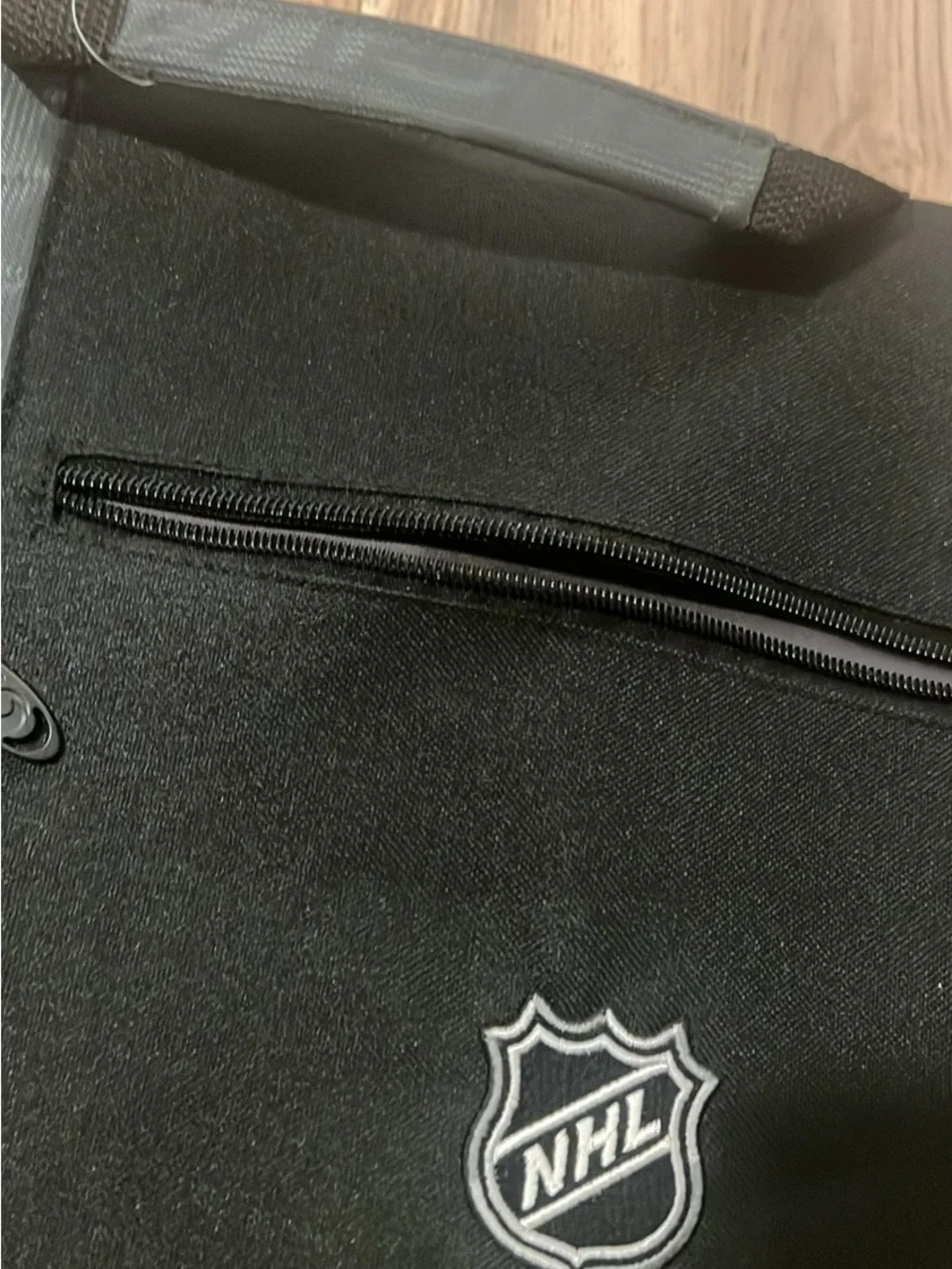 NHL Black and Gray Quilted Messenger Bag with Front Logo